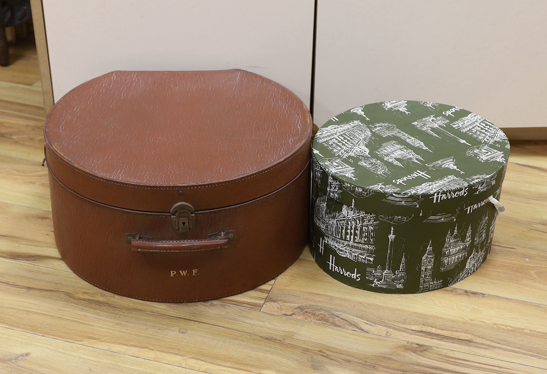 A circular Harrods branded hat box and a larger gents brown leather hat box, Harrods box 36cm diameter